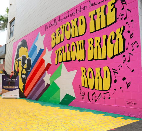 Yellow Brick Road And Elton John Mural - Mackay Tourism 0