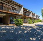 Unit 2 Rainbow Surf Modern double storey townhouse with large shared pool close to beach  shops - Mackay Tourism