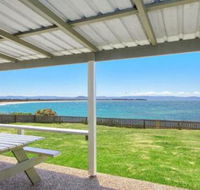 Amazing Aspects perched above Tilbury Cove - Mackay Tourism