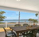 Bellevue overlooking serene Lake Woolumboola - Mackay Tourism