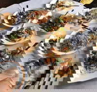 Mandarin Coin - Mackay Tourism