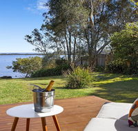 Braeside - waterfront fireplace - Mackay Tourism