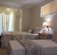Theme Parks Amituofo Guest House - Mackay Tourism