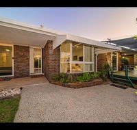 Woorim Secluded Palms Cottage - Mackay Tourism