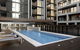 Chic 1-Bed With City Views Parking Gym & Pool - thumb 4