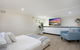 Idyllic 4-Bed Home With Alfresco Area Near Beach - thumb 2