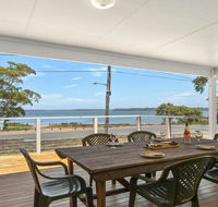 Bellevue - overlooking serene Lake Woolumboola - Mackay Tourism